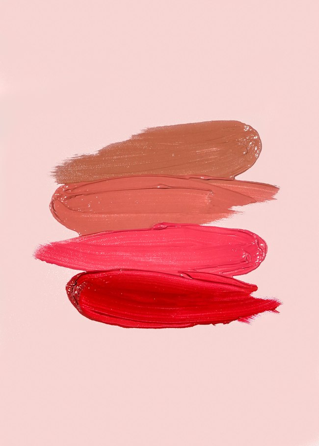 Lipstick shades on a pink background